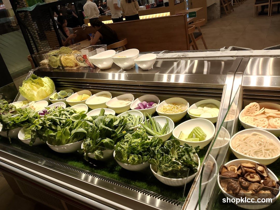 Buffet Display of Fresh Vegetables and Noodles
