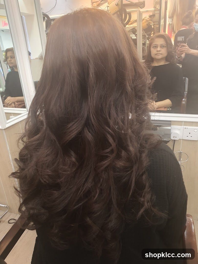 Woman with styled brown hair
