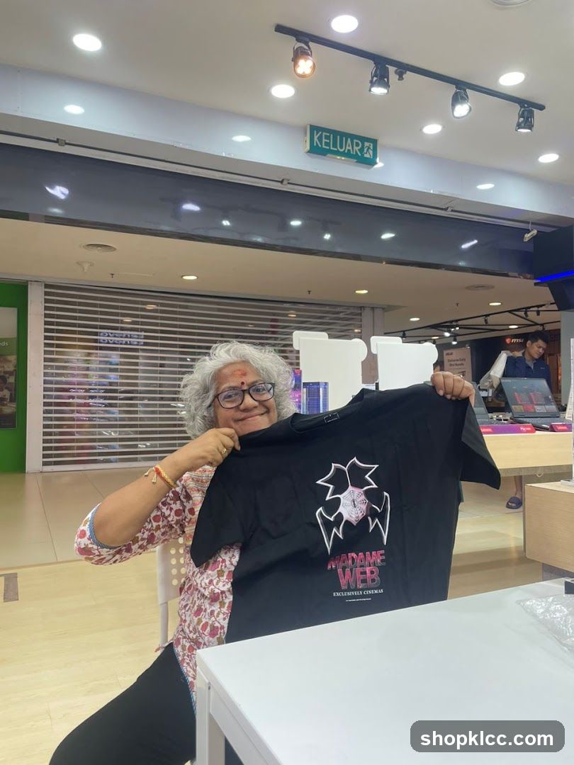 Woman holding a t-shirt
