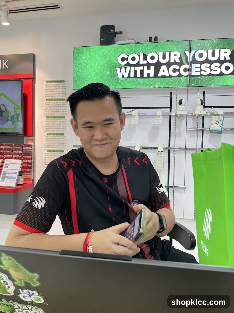 Man holding a smartphone in a store