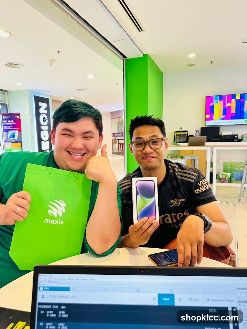 Two men with a new phone