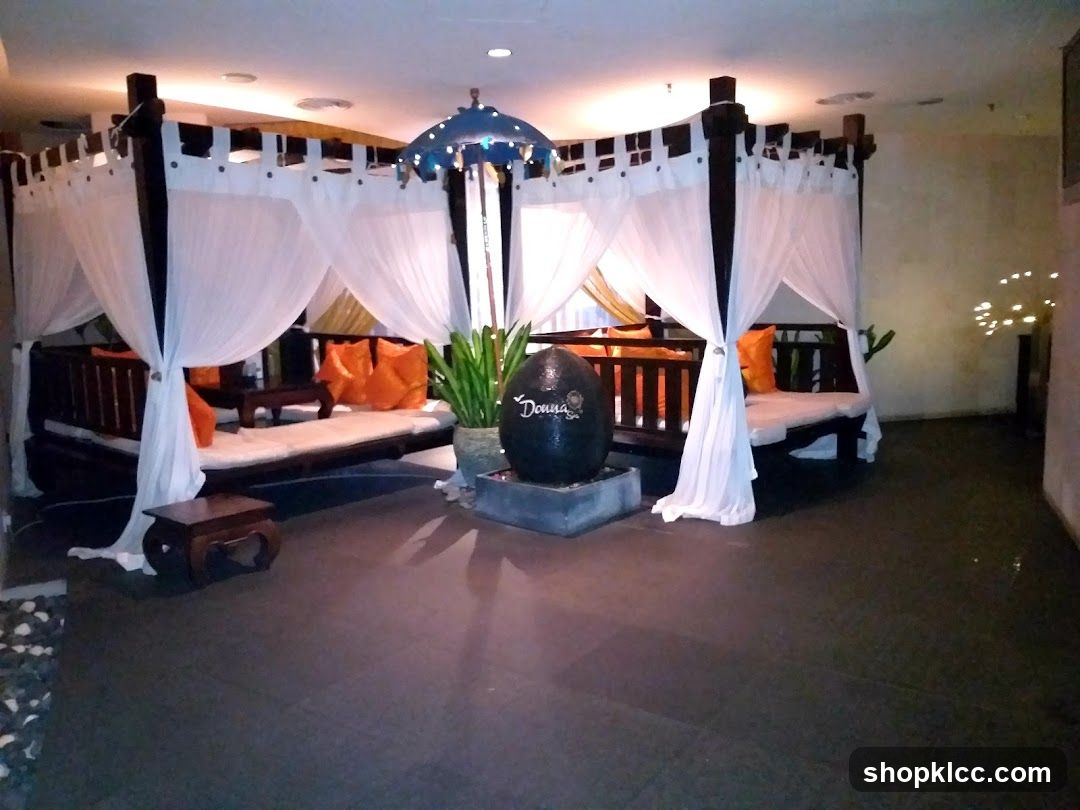 Relaxation Area with Daybeds and Water Feature