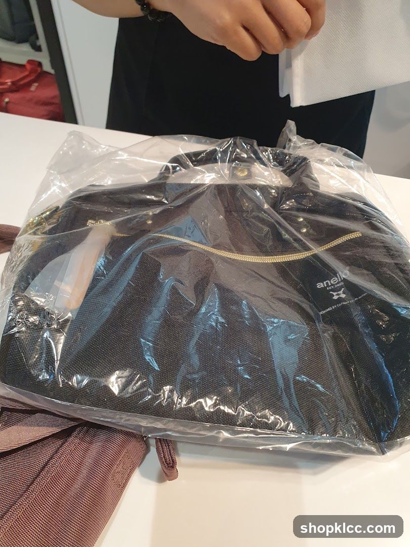 Bag in Plastic Packaging
