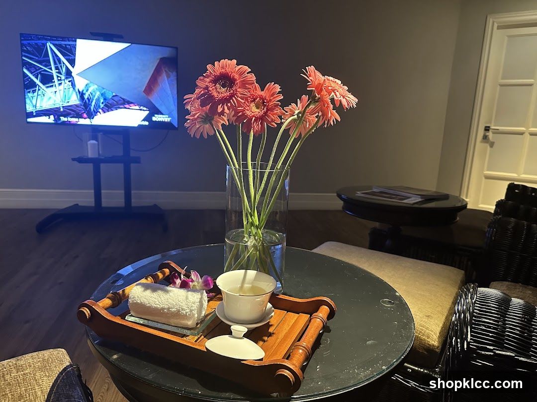 Spa waiting area with tea and flowers