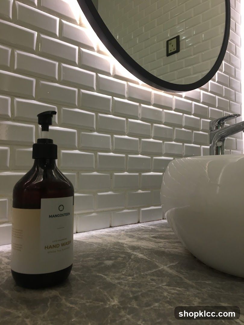 Hand Wash Bottle by Sink
