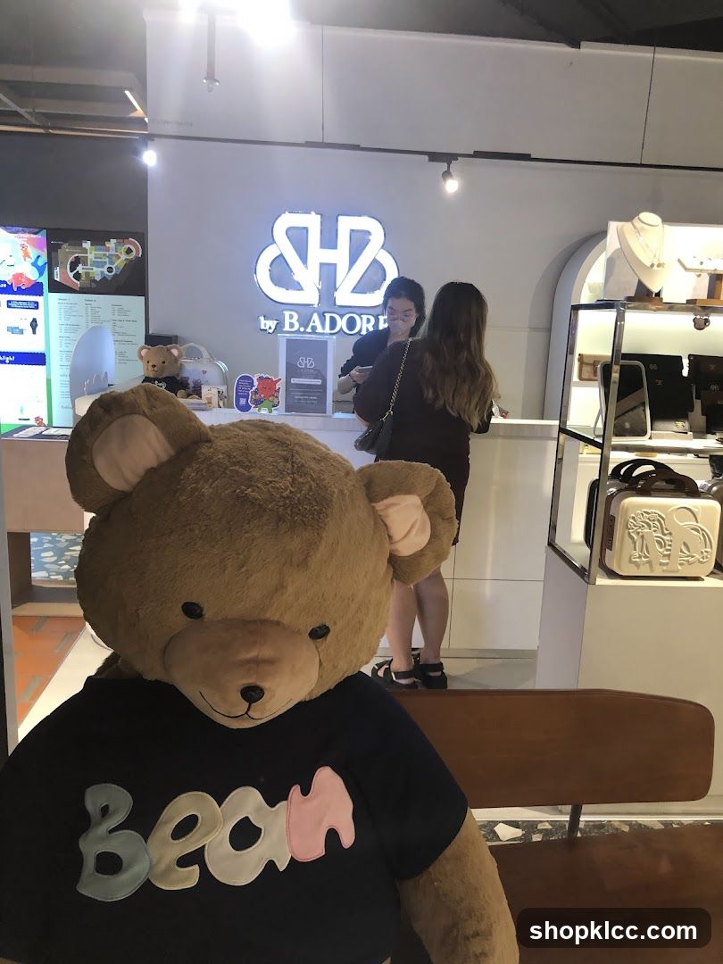 Giant teddy bear in front of a store counter