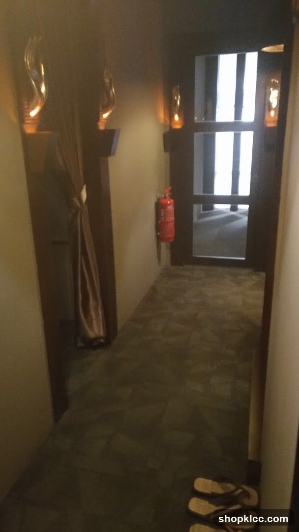 Hallway with Decorative Lighting and Fire Extinguisher