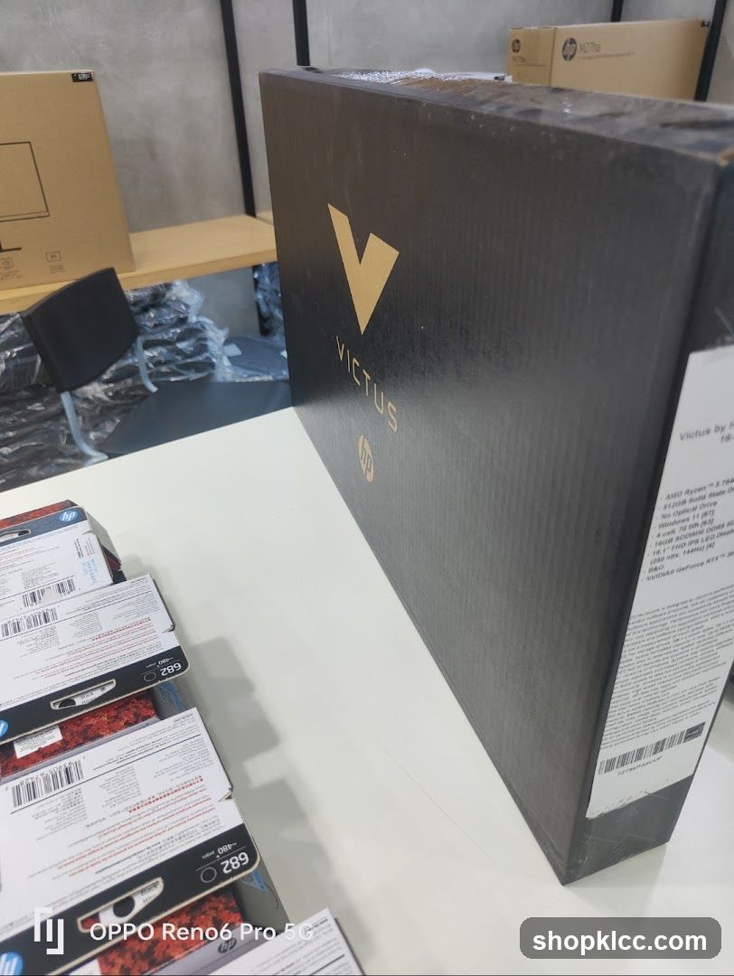 HP Victus Laptop Box and Ink Cartridges