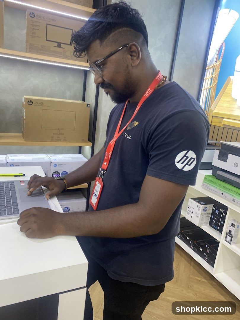 Man working in electronics store