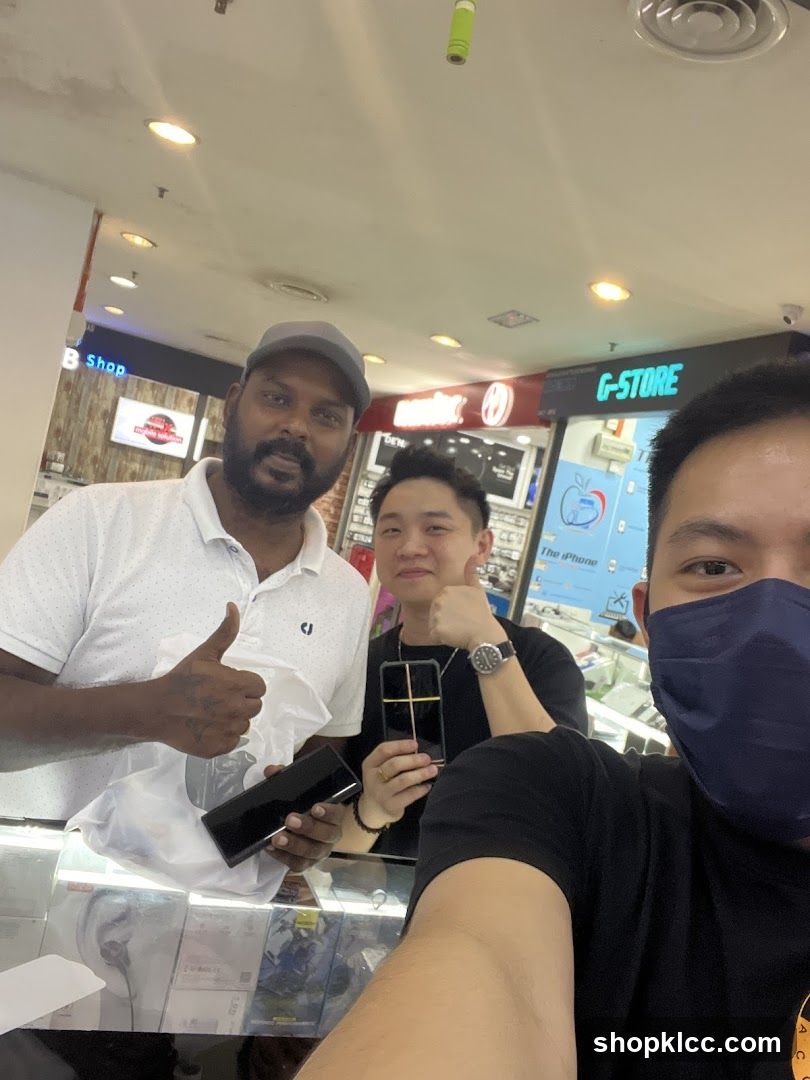 Three men in a store