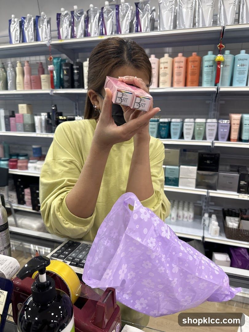 Woman holding product boxes
