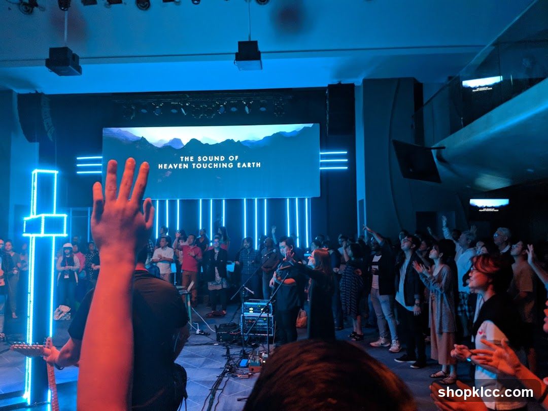 Congregation raising hands during a service