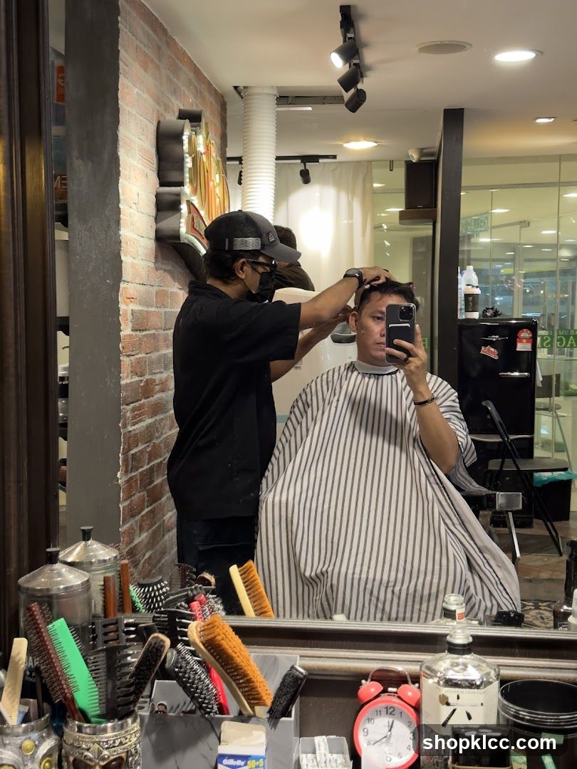 Barber cutting hair