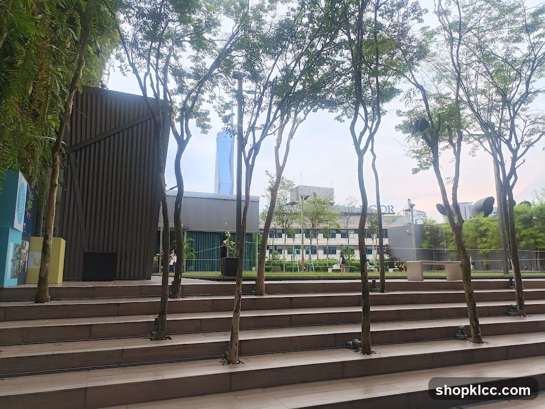Outdoor seating area with trees and buildings