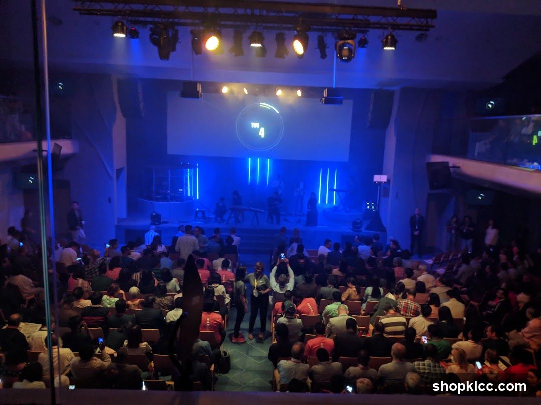 Audience watching a performance on stage