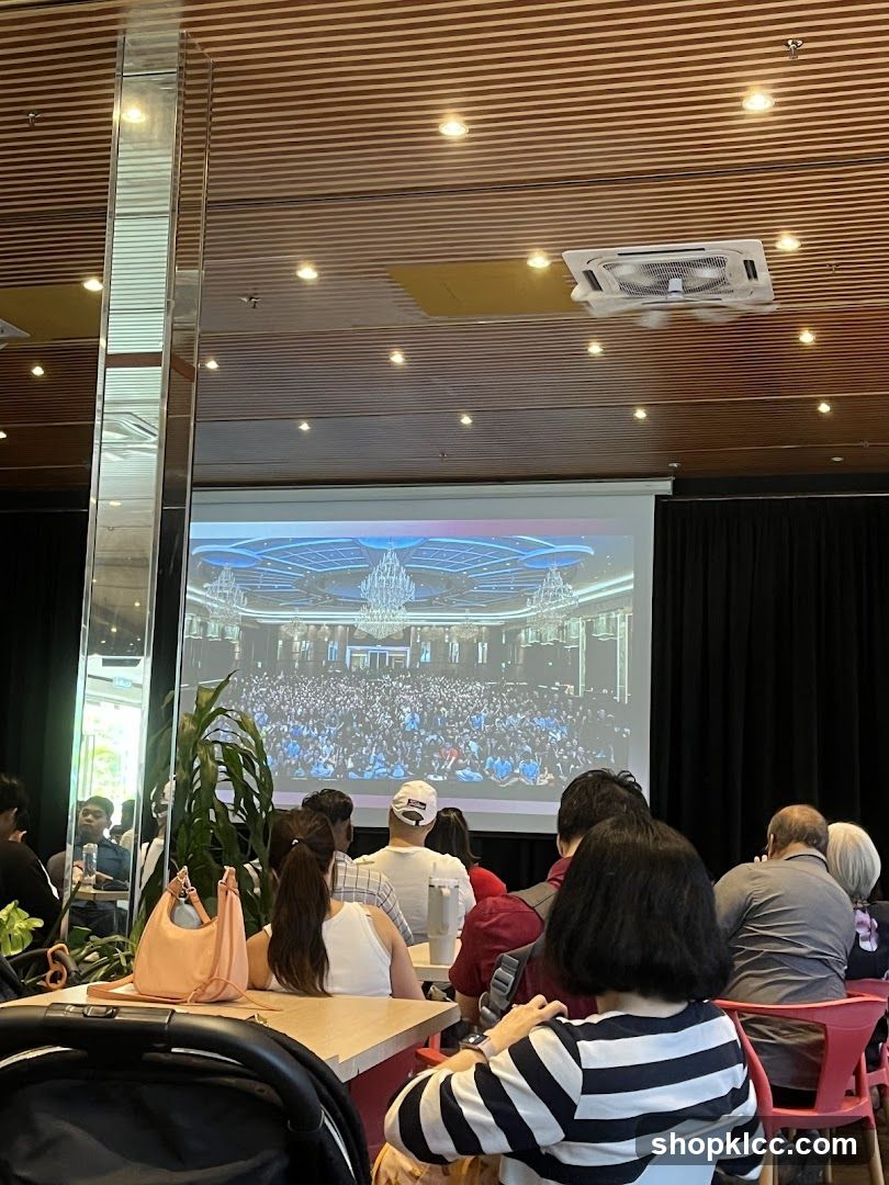 Audience watching a presentation