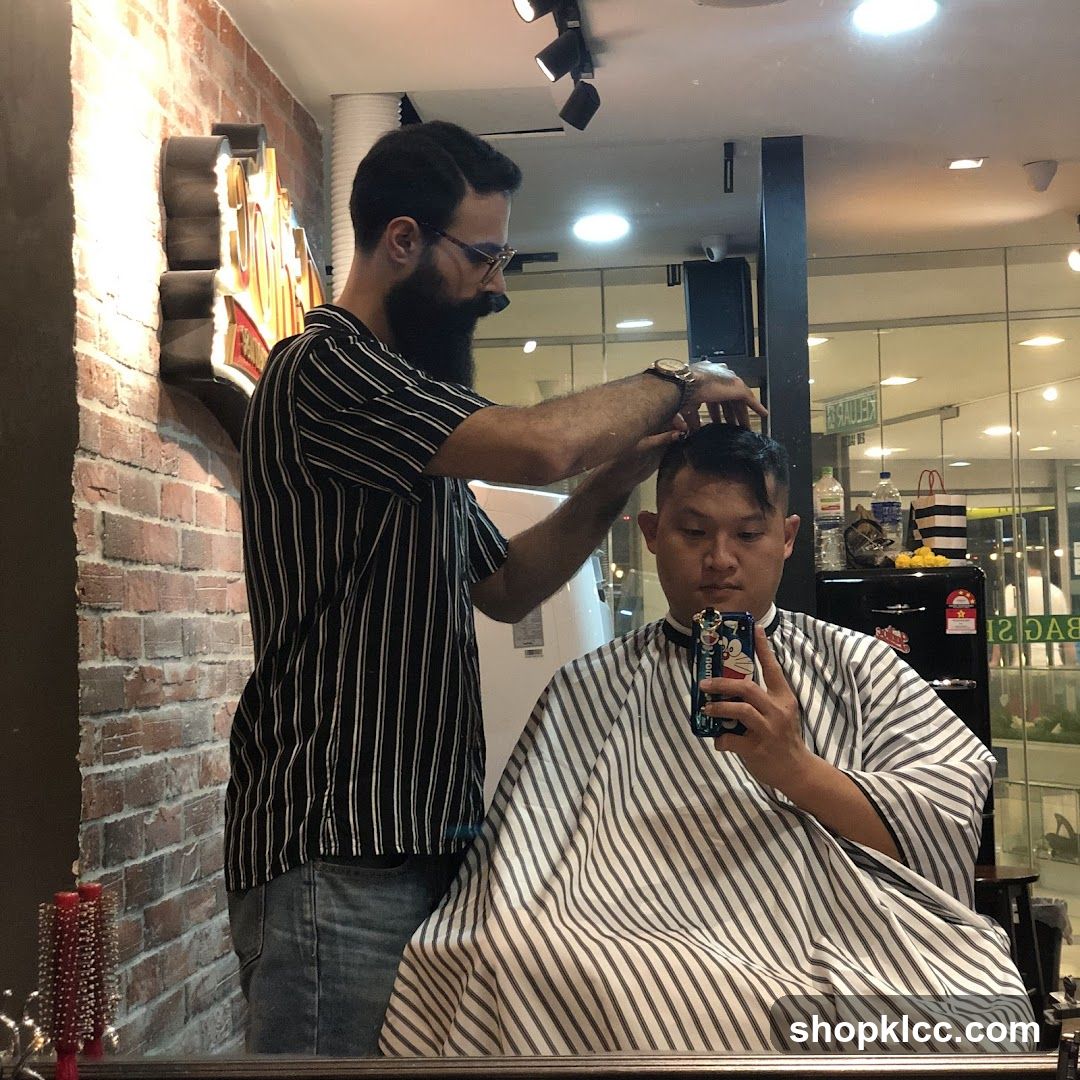 Barber cutting hair