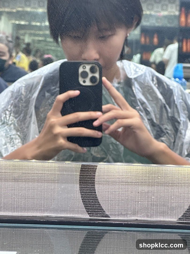 Person taking a selfie in a salon