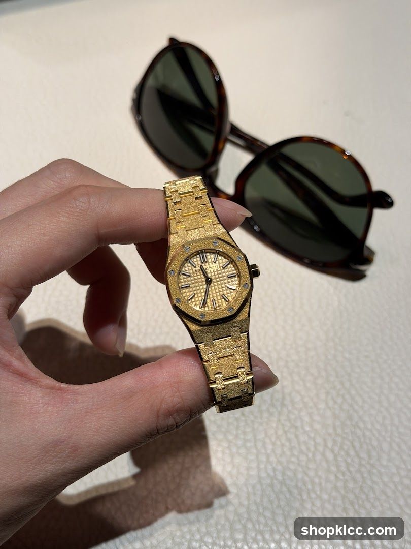 Gold Watch and Sunglasses