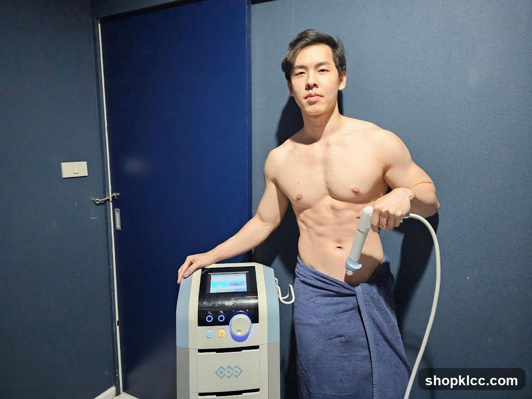 Man with body sculpting device