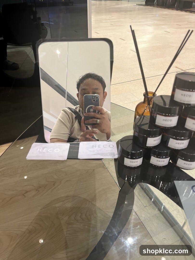 Selfie in a store with HECO branded products