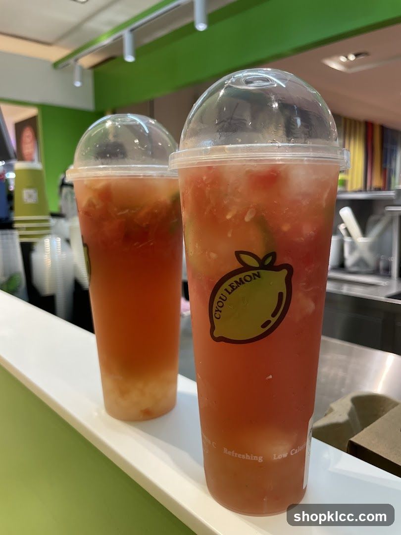 Two fruit drinks with logo