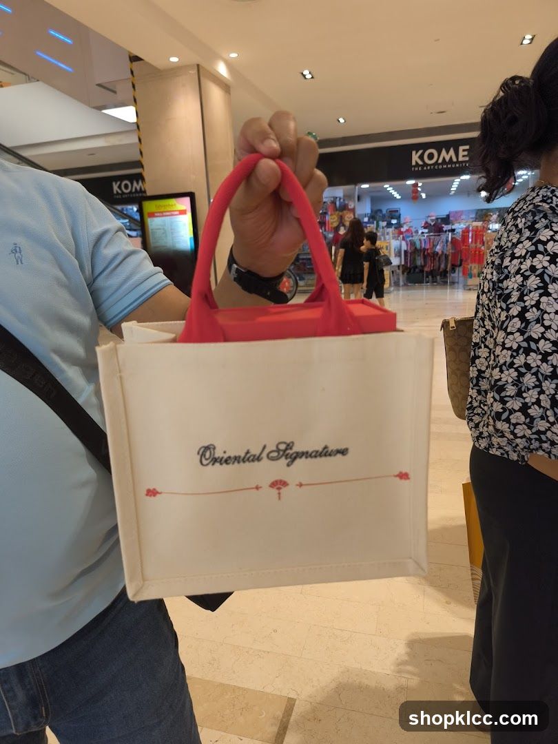 Person holding a tote bag