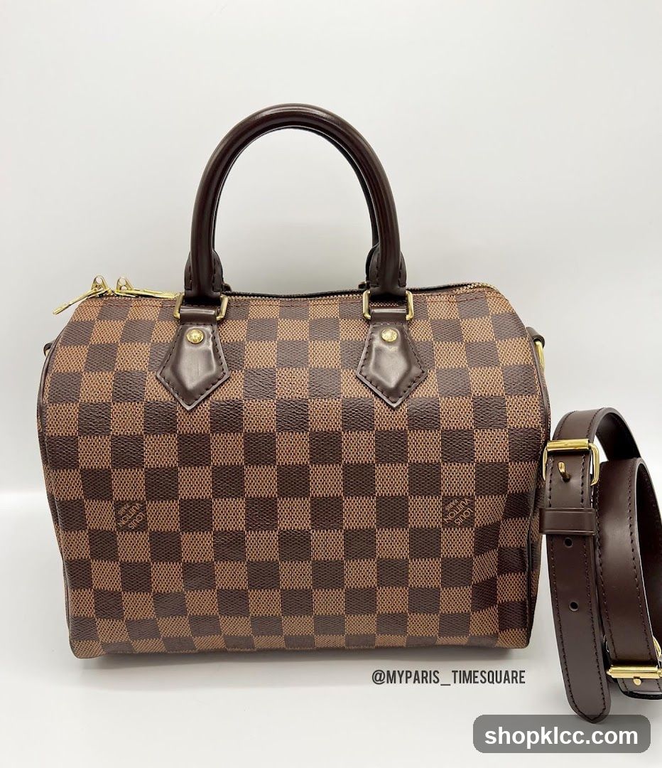 Brown checkered handbag with shoulder strap