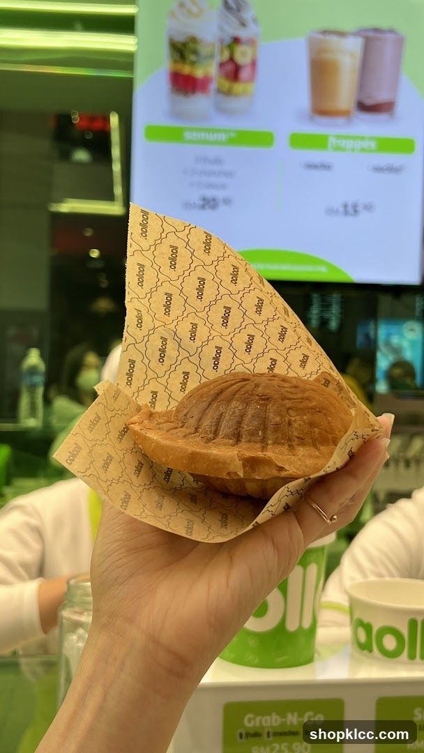 Hand holding a pastry