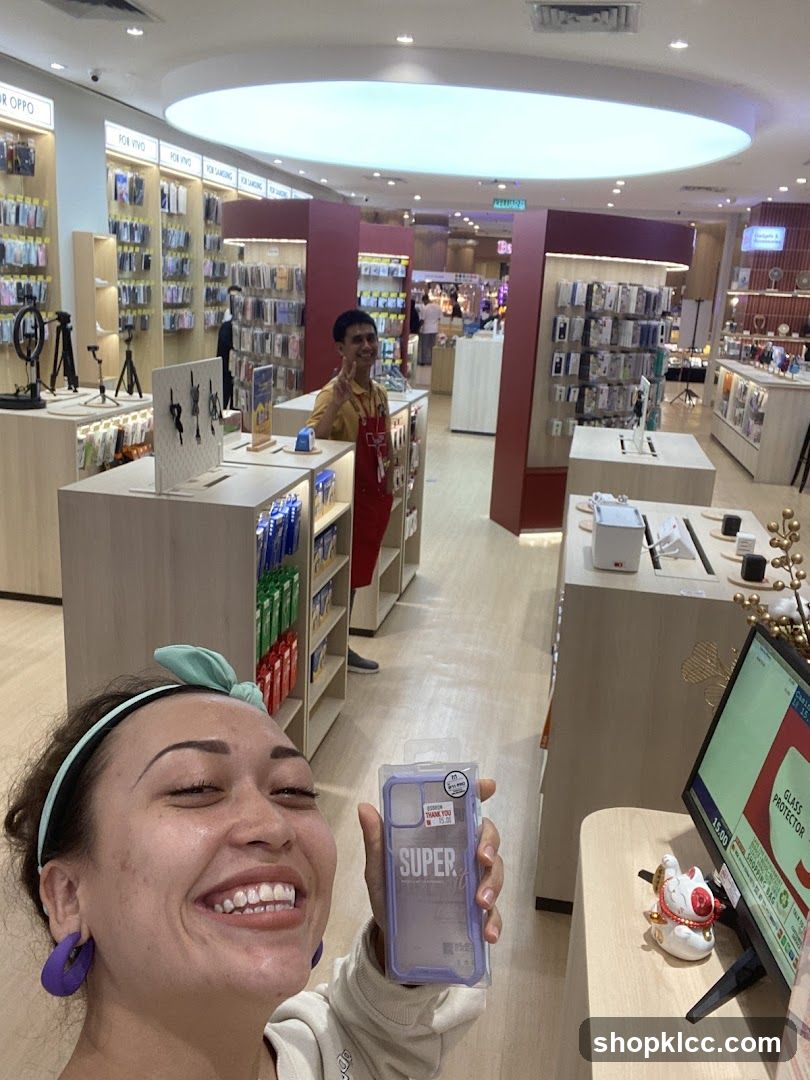 Woman holding a phone case in a store