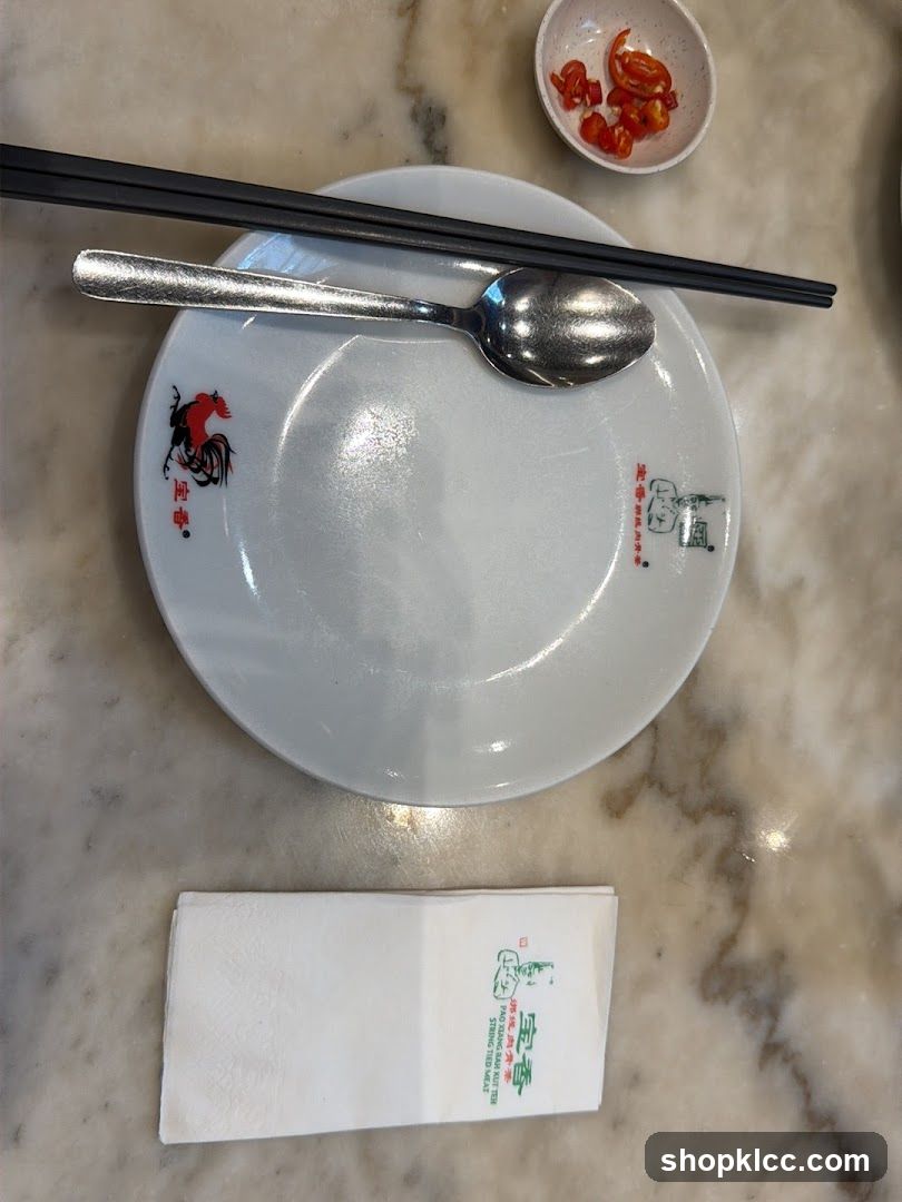 Table Setting with Chopsticks, Spoon, Plate, and Napkin