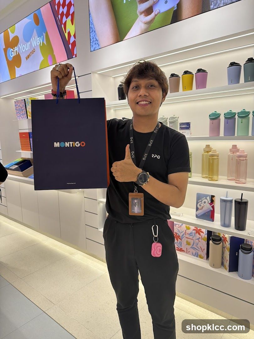 Man holding a shopping bag in a store