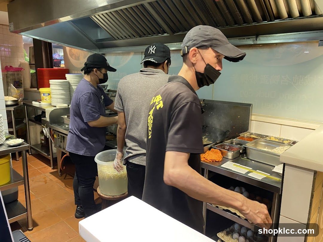 Kitchen Staff Preparing Food