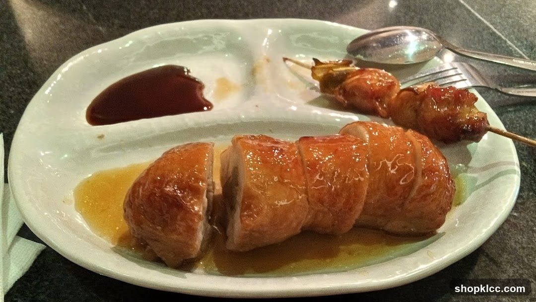 Sliced Roasted Chicken with Skewered Appetizers