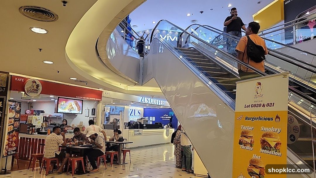 Mall Interior with Food Stalls and Escalators