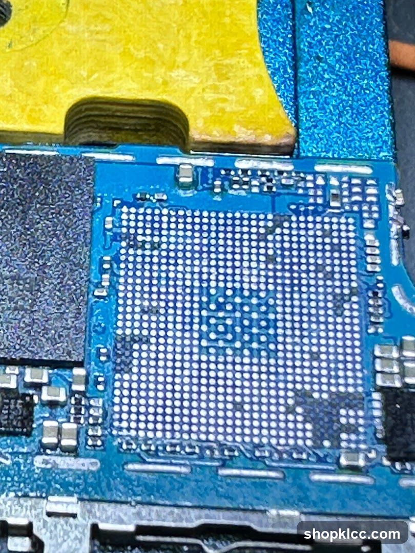 Close-up of electronic circuit board with solder balls