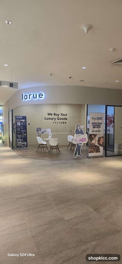 Shopping Mall Interior with Larue Signage