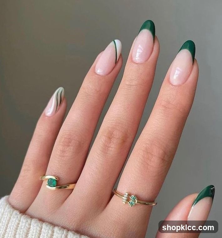Elegant Green and Nude French Manicure with Gemstone Rings