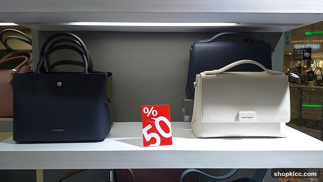 Handbag Display with Discount Sign
