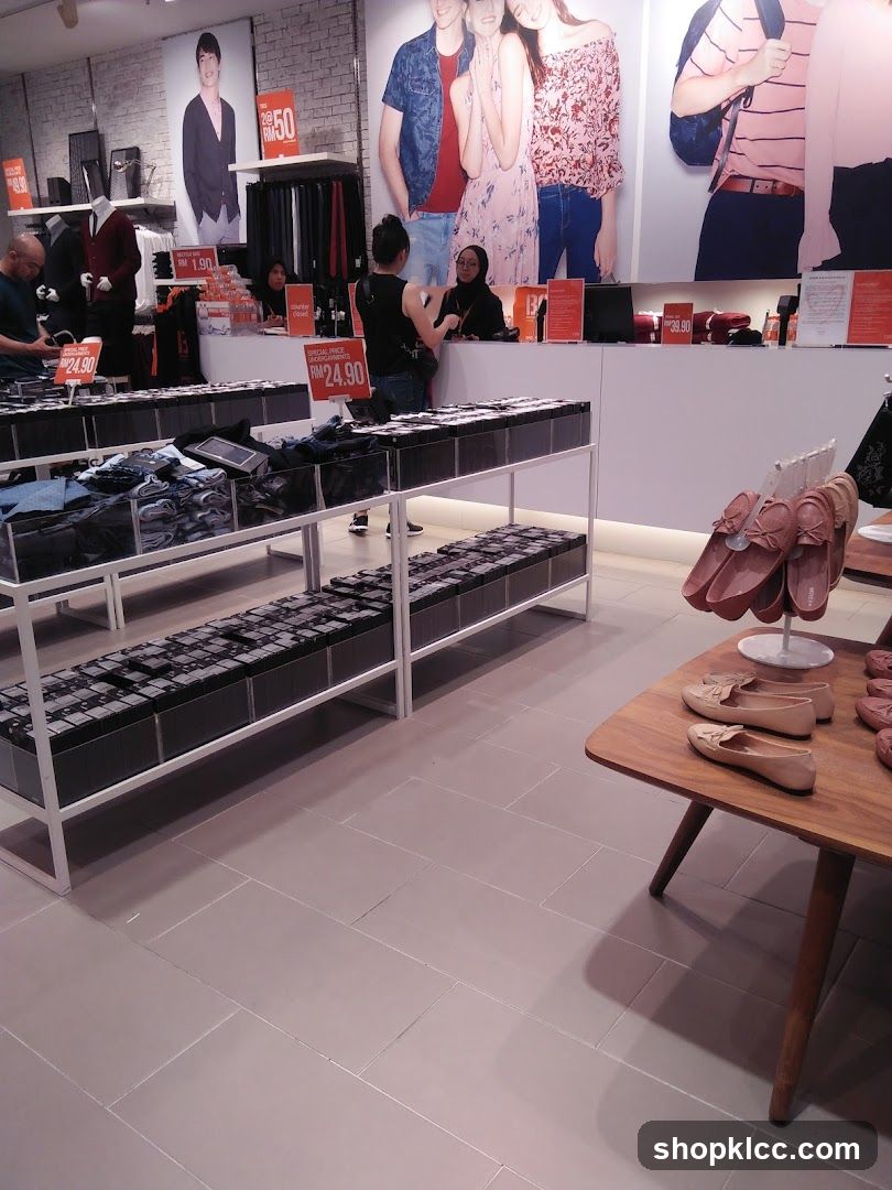 Clothing store interior with sale signs