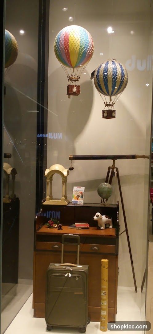 Window Display with Hot Air Balloons and Travel Items