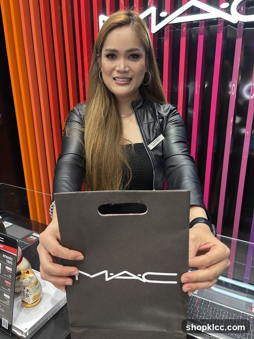MAC Makeup Artist with Shopping Bag