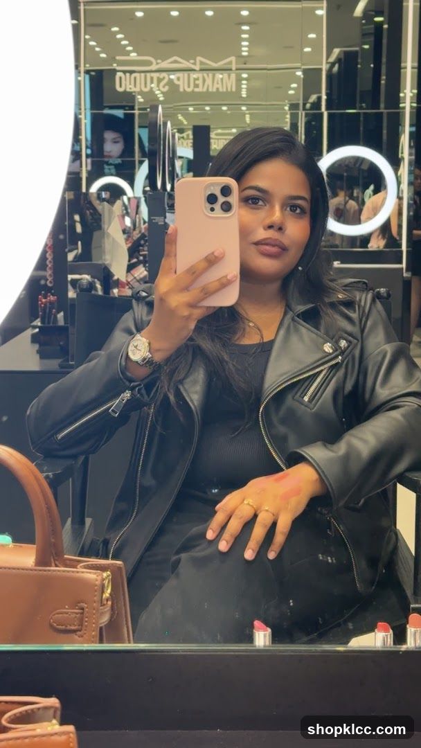 Woman taking a selfie in a makeup store