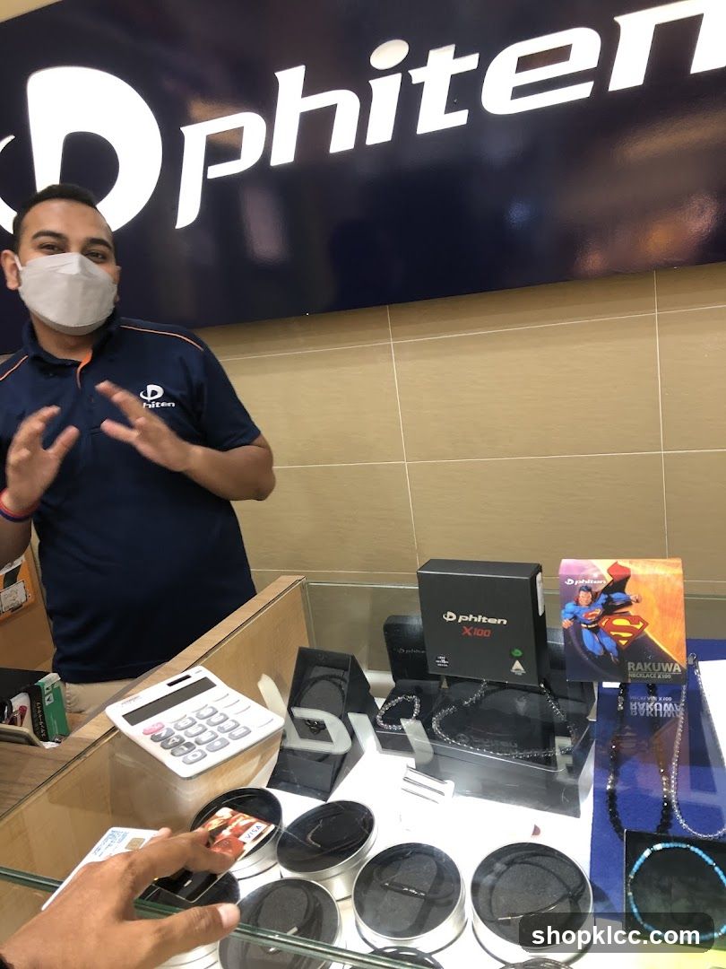 Store employee assisting customer