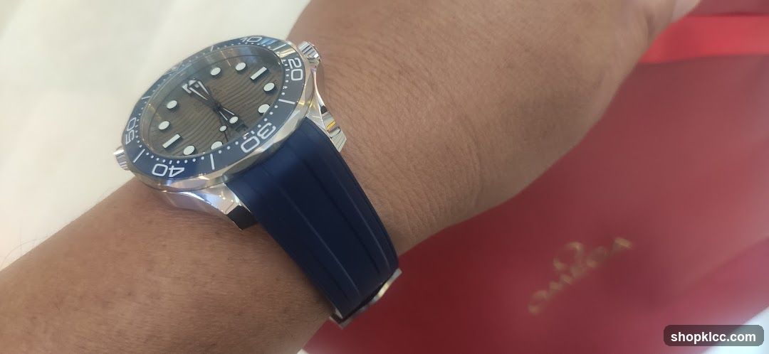 Watch on Wrist with Red Bag