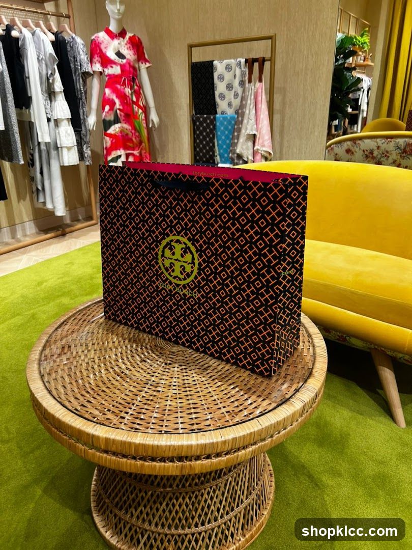 Tory Burch shopping bag on a table