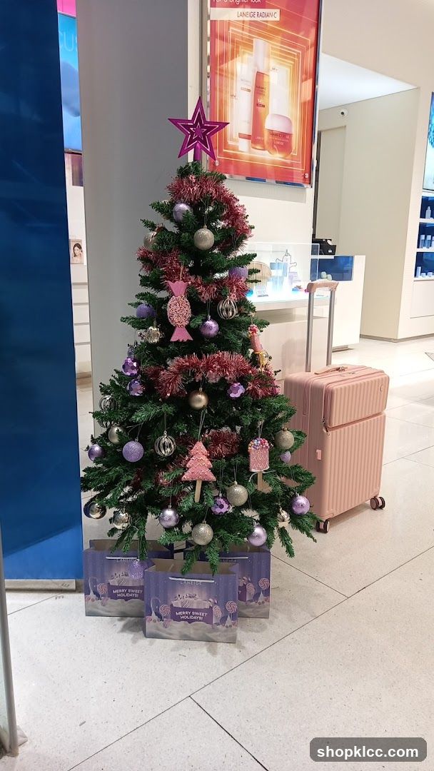Christmas Tree Display with Luggage