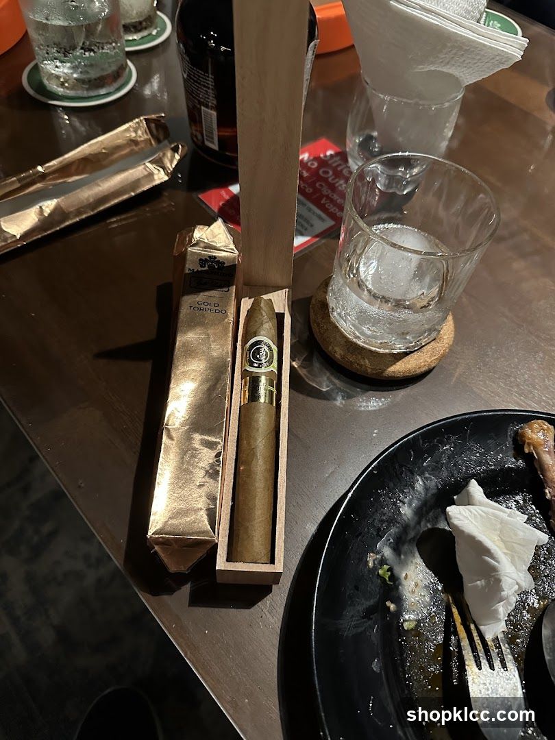 Cigar and Drinks on Table