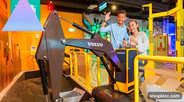 Children operating a Volvo excavator simulator