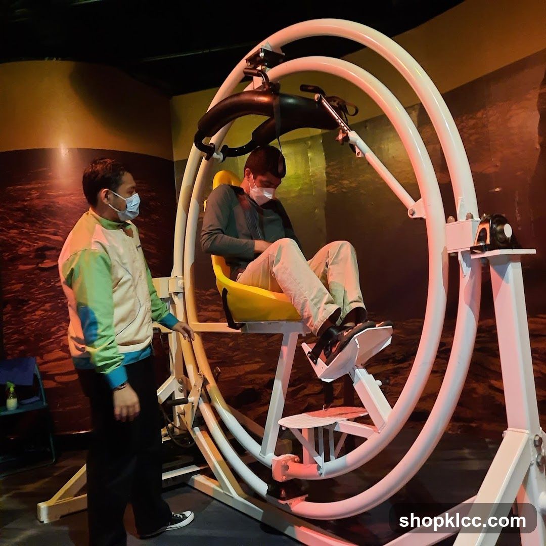 Man on Gyroscope Ride